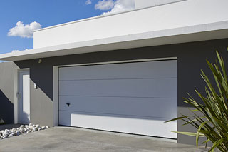 Porte de garage sectionnelle latérale ou verticale